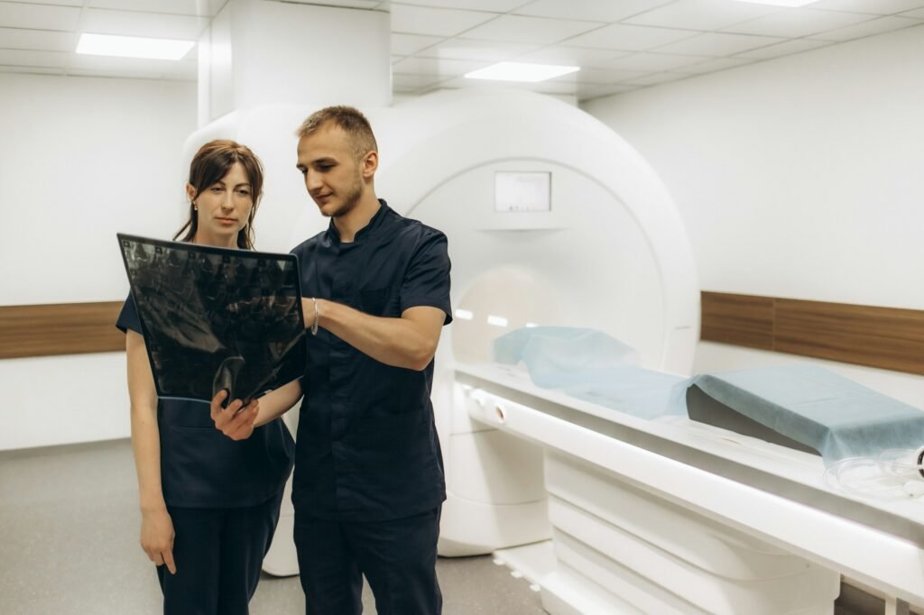 Colleagues radiologists are holding x-rays in their hands after CT computed tomograph